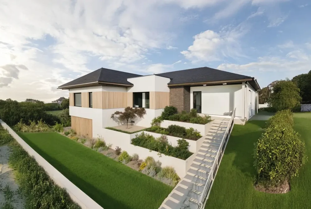 Extérieur résidentiel avec maison à étage, balcon vitré et terrasse